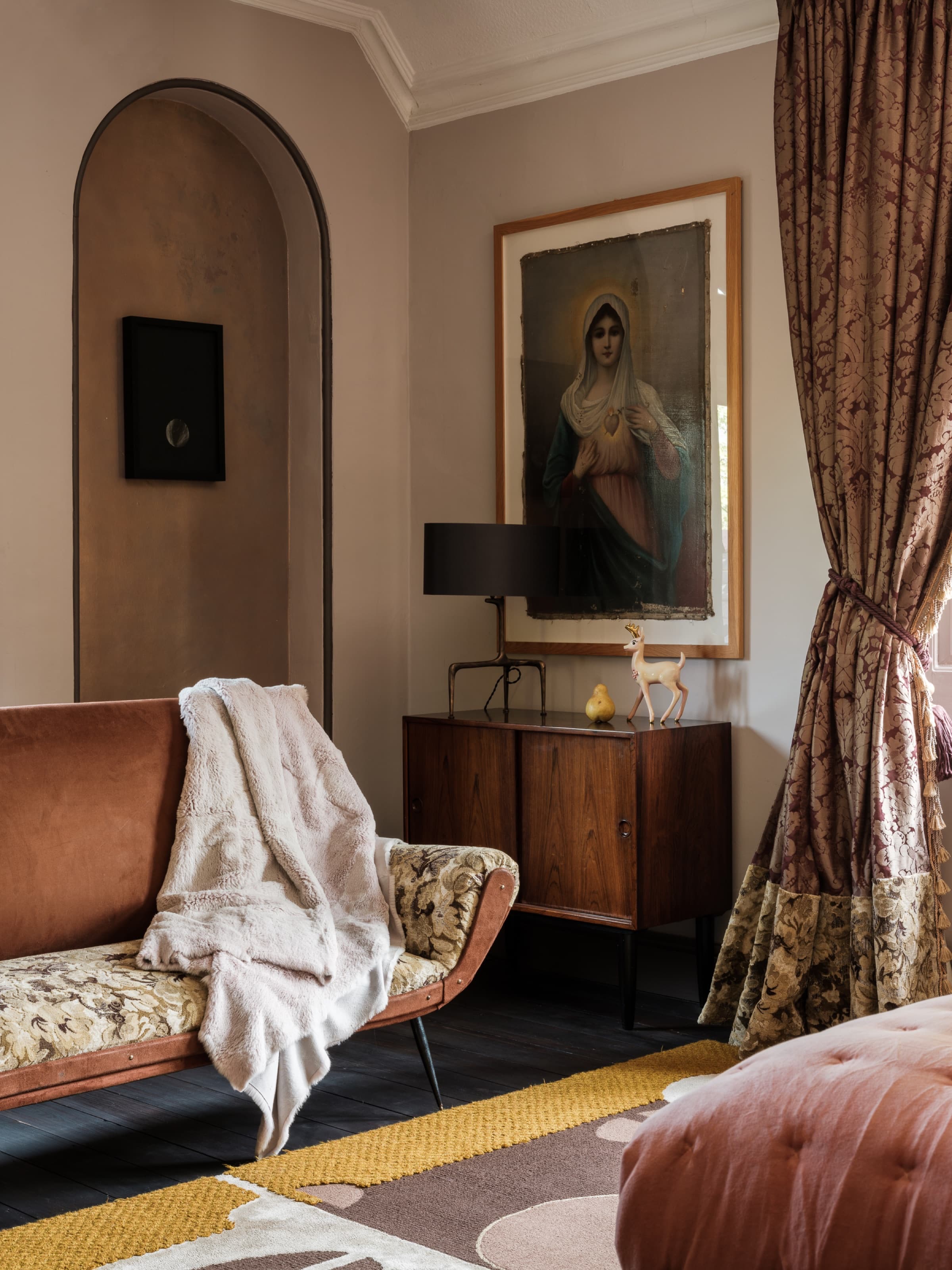 Bedroom through the stone archway