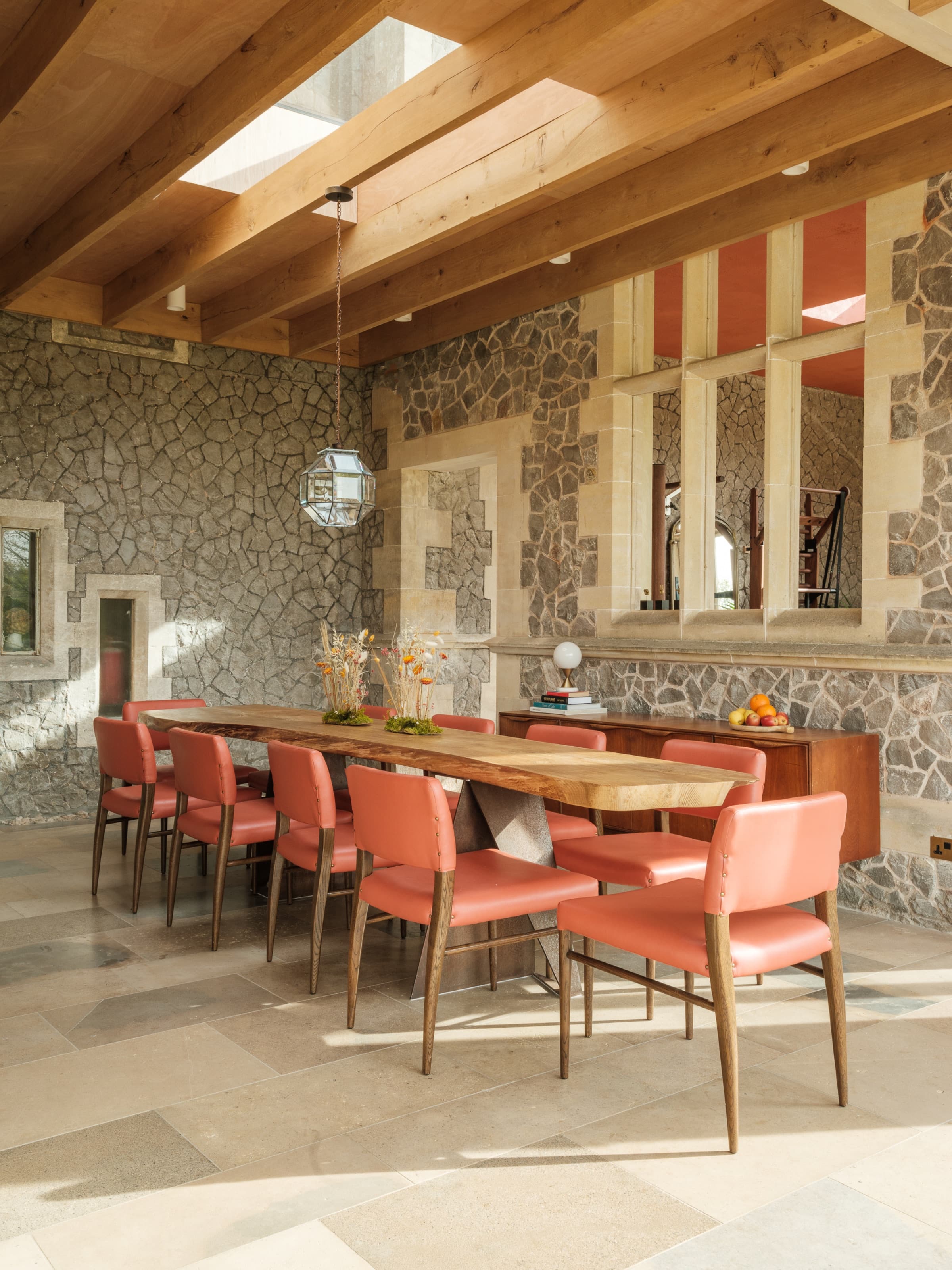 Somerleaze dining room, long table, pink chairs