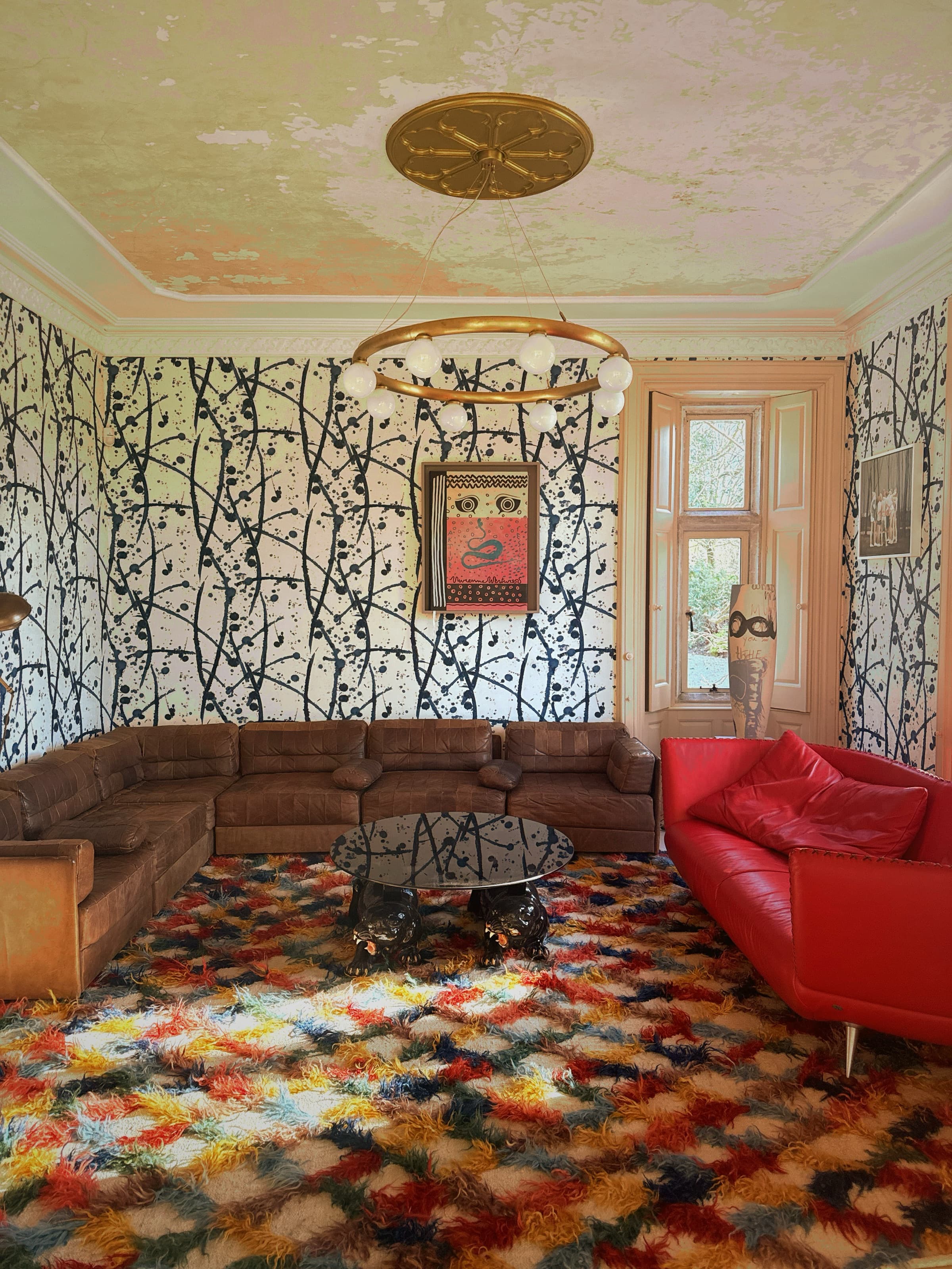 Somerleaze Pollock wallpaper room, red sofa