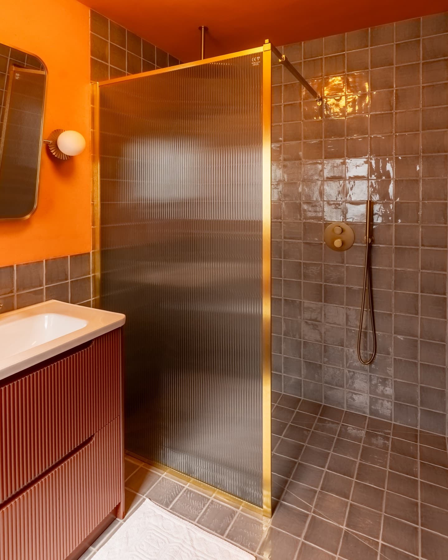 Ensuite shower, green zellige tile, brass rainfall head